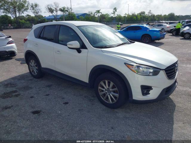  Salvage Mazda Cx